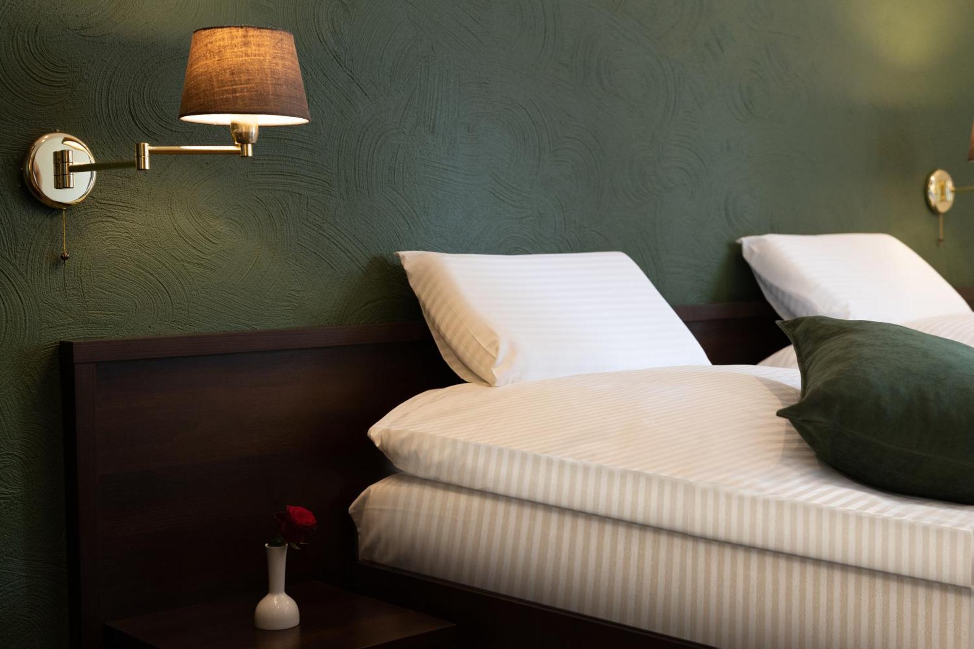 Doppel- oder Zweibettzimmer